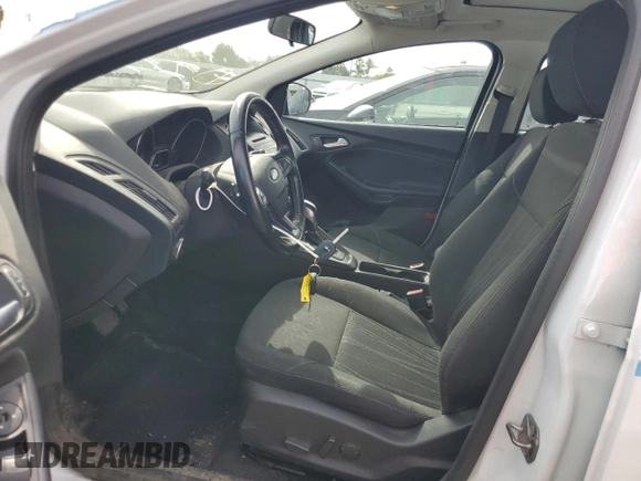 2015 Ford Focus SE with VIN 1FADP3K29FL334599, listed as a Copart auction lot 46926475 with 127,537 mi miles and Salvage Title. Bid and sale history available at DreamBid. Image 7.
