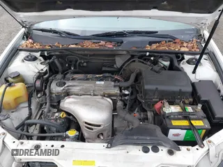 2004 Toyota Camry LE with VIN JTDBE32K840256161, listed as a IAAI auction lot 42000050 with 367,016 mi miles. Bid and sale history available at carsss.com. Image 10.