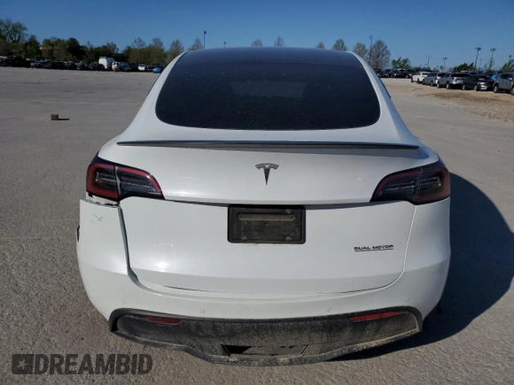 2021 Tesla Model Y Performance with VIN 5YJYGDEF3MF262878, listed as a Copart auction lot 52897595 with 50,939 mi miles and Salvage Title. Bid and sale history available at DreamBid. Image 6.