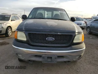2004 Ford F-150 with VIN 2FTRF08W74CA53629, listed as a Copart auction lot 87326734 with 229,631 mi miles and Salvage title. Bid and sale history available at DreamBid. Image 5.