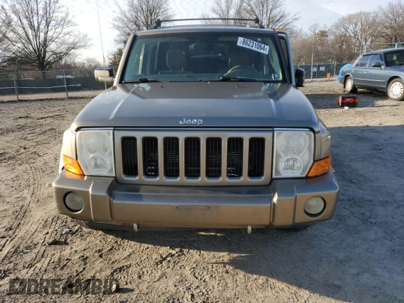 2006 Jeep Commander with VIN 1J8HG48K56C293759, listed as a Copart auction lot 86231064 with 173,203 mi miles and Salvage Title. Bid and sale history available at carsss.com. Image 5.