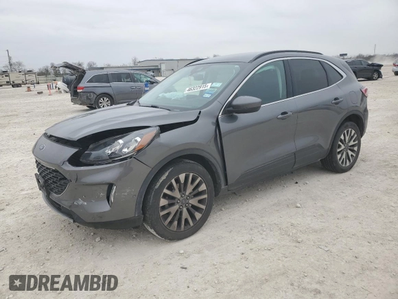 2021 Ford Escape Titanium with VIN 1FMCU9J9XMUA57500, listed as a Copart auction lot 46322915 with 67,101 mi miles and Salvage Title. Bid and sale history available at carsss.com. Image 1.