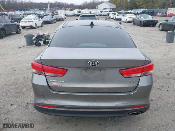 2016 Kia Optima EX with VIN 5XXGU4L33GG108511, listed as a IAAI auction lot 41355565 with 167,111 mi miles. Bid and sale history available at carsss.com. Image 16.