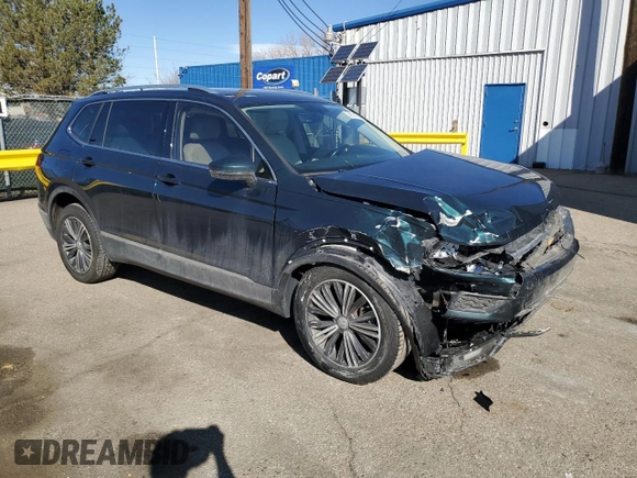 2019 Volkswagen Tiguan SE with VIN 3VV2B7AX9KM099426, listed as a Copart auction lot 48797565 with 74,009 mi miles and Salvage Title. Bid and sale history available at DreamBid. Image 4.