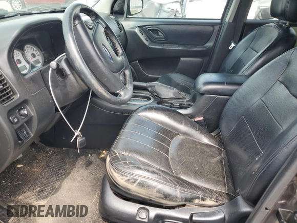 2005 Ford Escape Limited with VIN 1FMYU04115KA63383, listed as a Copart auction lot 59706164 with 212,167 mi miles and Salvage Title. Bid and sale history available at carsss.com. Image 7.