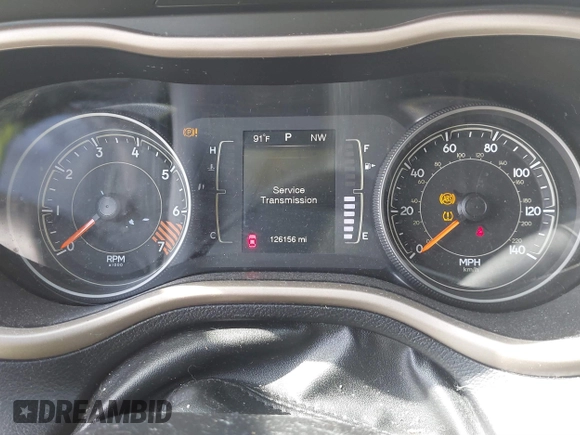 2015 Jeep Cherokee Latitude with VIN 1C4PJLCB4FW683904, listed as a IAAI auction lot 41579059 with 126,156 mi miles and . Bid and sale history available at carsss.com. Image 7.