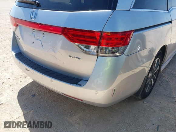 2014 Honda Odyssey Touring with VIN 5FNRL5H97EB094353, listed as a IAAI auction lot 41701712 with 141,228 mi miles and . Bid and sale history available at DreamBid. Image 20.