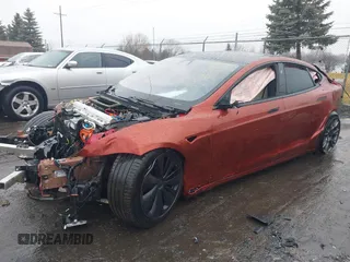 2021 Tesla Model S Plaid z VIN 5YJSA1E64MF441923, wystawiony jako IAAI lot #41465456 z przebiegiem Nie podano mil oraz . Historia ofert i sprzedaży dostępna na DreamBid. Obrazek 2.