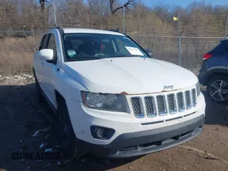 2014 Jeep Compass Latitude with VIN 1C4NJDEB8ED622012, listed as a IAAI auction lot 41917126 with 143,065 mi miles. Bid and sale history available at carsss.com. Image 1.