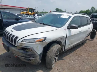 2017 Jeep Cherokee Trailhawk with VIN 1C4PJMBSXHW657446, listed as a IAAI auction lot 42406437 with 158,351 mi miles and . Bid and sale history available at DreamBid. Image 18.