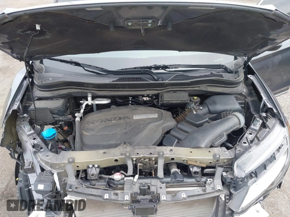 2019 Honda Pilot Touring 8-Passenger with VIN 5FNYF5H93KB028641, listed as a IAAI auction lot 42524078 with 56,744 mi miles and . Bid and sale history available at DreamBid. Image 10.
