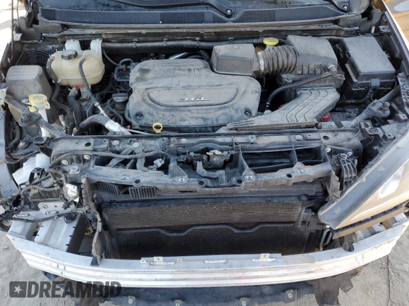 2017 Chrysler Pacifica Touring L with VIN 2C4RC1BG7HR569315, listed as a Copart auction lot 47018605 with 131,519 mi miles and Salvage Title. Bid and sale history available at DreamBid. Image 12.
