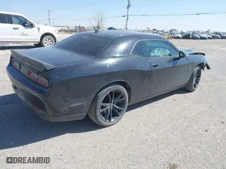 2017 Dodge Challenger SXT Plus with VIN 2C3CDZAG9HH501594, listed as a IAAI auction lot 41628513 with 151,399 mi miles. Bid and sale history available at carsss.com. Image 4.