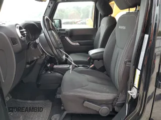 2018 Jeep Wrangler JK Unlimited Sahara with VIN 1C4HJWEG3JL921167, listed as a Copart auction lot 57310714 with 59,110 mi miles and Salvage Title. Bid and sale history available at carsss.com. Image 7.