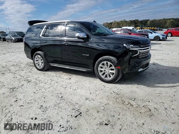 2023 Chevrolet Tahoe Premier z VIN 1GNSCSKD3PR543190, wystawiony jako Copart lot #80420224 z przebiegiem 9 999 mil mil oraz Szkoda całkowita • Salvage title. Historia ofert i sprzedaży dostępna na DreamBid. Obrazek 11.