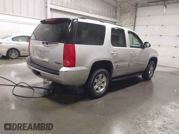 2011 GMC Yukon SLE with VIN 1GKS2AE01BR233860, listed as a IAAI auction lot 41838392 with 226,611 mi miles. Bid and sale history available at carsss.com. Image 4.