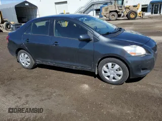 2012 Toyota Yaris with VIN JTDBT4K36CL028550, listed as a Copart auction lot 52071475 with 173,922 mi miles and Salvage Title. Bid and sale history available at DreamBid. Image 4.