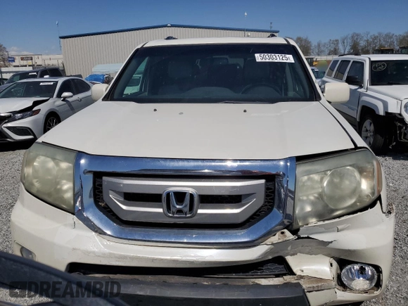 2011 Honda Pilot Touring z VIN 5FNYF3H9XBB044579, wystawiony jako Copart lot #50303125 z przebiegiem 227 482 mil mil oraz Szkoda całkowita • Salvage title. Historia ofert i sprzedaży dostępna na DreamBid. Obrazek 5.