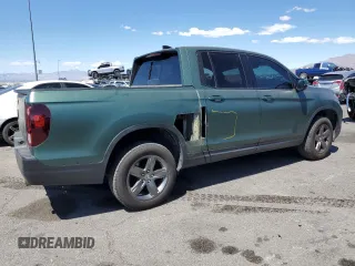2022 Honda Ridgeline RTL-E with VIN 5FPYK3F73NB014672, listed as a Copart auction lot 54617475 with 76,160 mi miles and Salvage title. Bid and sale history available at DreamBid. Image 3.