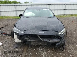2018 Ford Fusion Titanium с VIN 3FA6P0K91JR183997, выставлен на аукционе Copart как лот 57717235 с пробегом 133 385 миль миль и Списание • Salvage title. История ставок и продаж доступна на DreamBid. Изображение 5.