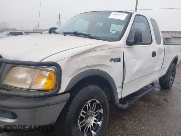 1997 Ford F-150 XL with VIN 1FTDX1863VNB01474, listed as a IAAI auction lot 41446672 with 223,296 mi miles. Bid and sale history available at carsss.com. Image 6.