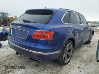 2017 Bentley Bentayga W12 z VIN SJAAC2ZV2HC014080, wystawiony jako Copart lot #44806115 z przebiegiem 63 077 mil mil oraz Szkody całkowita. Historia ofert i sprzedaży dostępna na DreamBid. Obrazek 3.