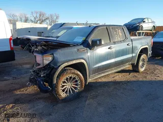 2023 GMC Sierra 1500 Denali Ultimate with VIN 1GTUUHEL8PZ169339, listed as a IAAI auction lot 40810905 with 26,566 mi miles. Bid and sale history available at carsss.com. Image 2.