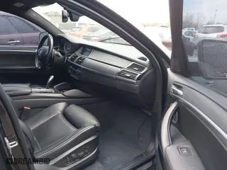 2012 BMW X6 M with VIN 5YMGZ0C58CLK14885, listed as a IAAI auction lot 42082928 with 131,900 mi miles. Bid and sale history available at carsss.com. Image 5.