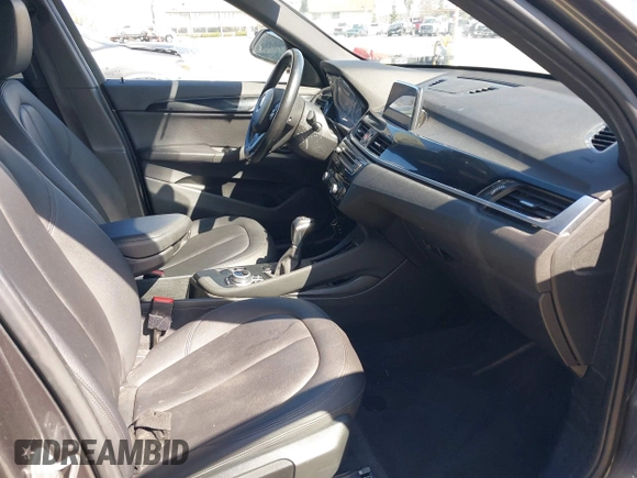 2018 BMW X1 sDrive28i with VIN WBXHU7C36J5L05628, listed as a IAAI auction lot 41708522 with 91,352 mi miles and . Bid and sale history available at DreamBid. Image 5.