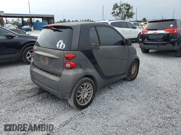 2012 Smart fortwo Pure with VIN WMEEJ3BA2CK519118, listed as a Copart auction lot 57813115 with 127,472 mi miles and Clean title. Bid and sale history available at DreamBid. Image 3.