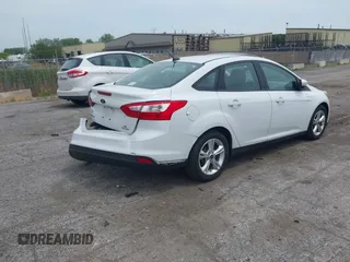 2013 Ford Focus SE with VIN 1FADP3F24DL380185, listed as a IAAI auction lot 42312998 with Not provided miles and . Bid and sale history available at DreamBid. Image 4.
