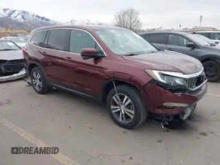 2018 Honda Pilot EX-L with VIN 5FNYF6H52JB039308, listed as a IAAI auction lot 41483798 with 122,885 mi miles. Bid and sale history available at carsss.com. Image 1.