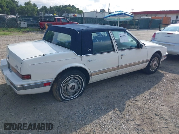 1991 Cadillac Seville z VIN 1G6KS53B9MU820155, wystawiony jako IAAI lot #40035441 z przebiegiem 78 021 mil mil oraz . Historia ofert i sprzedaży dostępna na DreamBid. Obrazek 4.