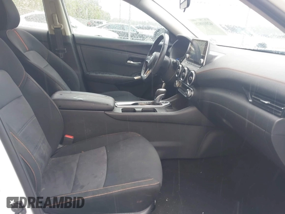 2023 Nissan Sentra SR with VIN 3N1AB8DV5PY272002, listed as a IAAI auction lot 42010828 with 13,210 mi miles and . Bid and sale history available at DreamBid. Image 5.