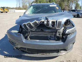 2019 Jeep Cherokee Latitude Plus with VIN 1C4PJLLB6KD466814, listed as a Copart auction lot 49403735 with 63,211 mi miles and Salvage Title. Bid and sale history available at DreamBid. Image 5.