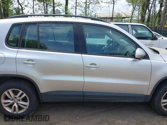 2016 Volkswagen Tiguan S with VIN WVGBV7AX1GW523335, listed as a IAAI auction lot 42091690 with 165,495 mi miles and . Bid and sale history available at DreamBid. Image 13.