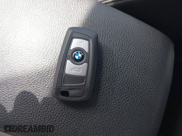 2015 BMW 3 Series 320i with VIN WBA3B1G58FNT03373, listed as a IAAI auction lot 41843859 with 98,439 mi miles. Bid and sale history available at carsss.com. Image 11.