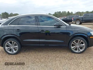 2017 Audi Q3 Premium Plus z VIN WA1JCCFS3HR002400, wystawiony jako IAAI lot #41464520 z przebiegiem 100 560 mil mil oraz . Historia ofert i sprzedaży dostępna na DreamBid. Obrazek 13.