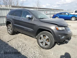 2014 Jeep Grand Cherokee Overland with VIN 1C4RJFCG4EC172361, listed as a Copart auction lot 49053155 with 144,916 mi miles and Salvage Title. Bid and sale history available at DreamBid. Image 4.