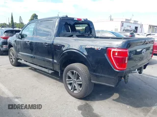 2023 Ford F-150 XL with VIN 1FTFW1ED8PFD08597, listed as a IAAI auction lot 41613094 with 7,266 mi miles and . Bid and sale history available at carsss.com. Image 3.