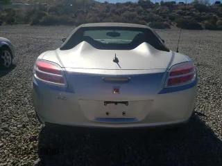2007 Saturn Sky z VIN 1G8MB35B47Y101765, wystawiony jako Copart lot #68054344 z przebiegiem 82 064 mil mil oraz Szkody całkowita. Historia ofert i sprzedaży dostępna na DreamBid. Obrazek 6.