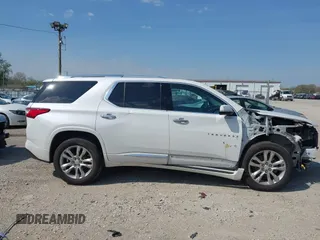 2018 Chevrolet Traverse High Country with VIN 1GNEVKKW9JJ111962, listed as a IAAI auction lot 42118324 with 104,311 mi miles and . Bid and sale history available at DreamBid. Image 14.