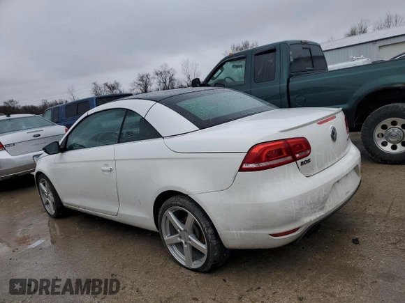 2013 Volkswagen Eos Komfort with VIN WVWBW8AH5DV001888, listed as a Copart auction lot 86886554 with 188,812 mi miles and Salvage Title. Bid and sale history available at DreamBid. Image 2.