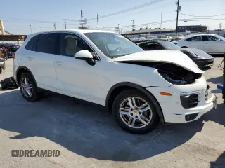 2016 Porsche Cayenne with VIN WP1AA2A20GLA00567, listed as a Copart auction lot 55452685 with Not provided miles and Salvage title. Bid and sale history available at DreamBid. Image 4.