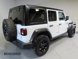 2022 Jeep Wrangler Unlimited Willys Sport with VIN 1C4HJXDN3NW263019, listed as a Copart auction lot 41880705 with 16,231 mi miles and Salvage Title. Bid and sale history available at DreamBid. Image 4.
