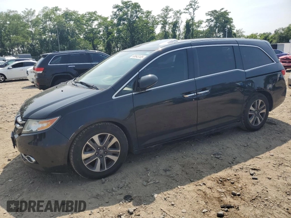 2014 Honda Odyssey Touring with VIN 5FNRL5H91EB015162, listed as a Copart auction lot 60643135 with 176,898 mi miles and Salvage title. Bid and sale history available at DreamBid. Image 1.