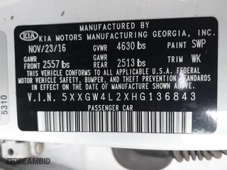 2017 Kia Optima SX with VIN 5XXGW4L2XHG136843, listed as a IAAI auction lot 41806606 with 157,899 mi miles. Bid and sale history available at carsss.com. Image 9.