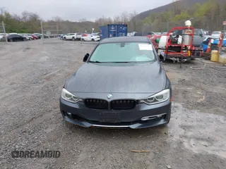 2013 BMW 3 Series 328i xDrive with VIN WBA3B3C56DF542509, listed as a IAAI auction lot 42010587 with 187,082 mi miles. Bid and sale history available at carsss.com. Image 12.