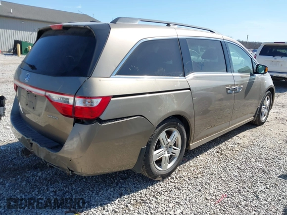 2012 Honda Odyssey Touring with VIN 5FNRL5H9XCB110672, listed as a IAAI auction lot 41826895 with 159,927 mi miles. Bid and sale history available at carsss.com. Image 4.