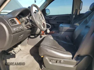 2010 Chevrolet Suburban LTZ with VIN 1GNUKKE37AR165641, listed as a Copart auction lot 88939935 with 203,190 mi miles and Salvage title. Bid and sale history available at DreamBid. Image 7.